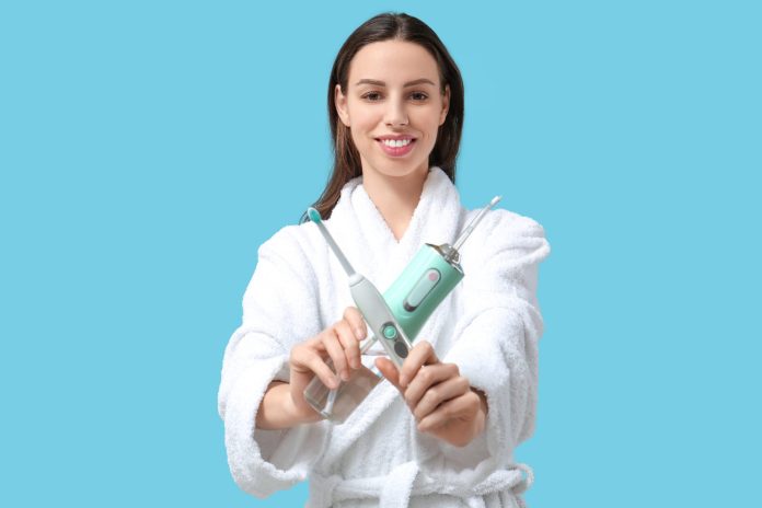 Do power brushes and water flossers really work?  – Summit Dental Health